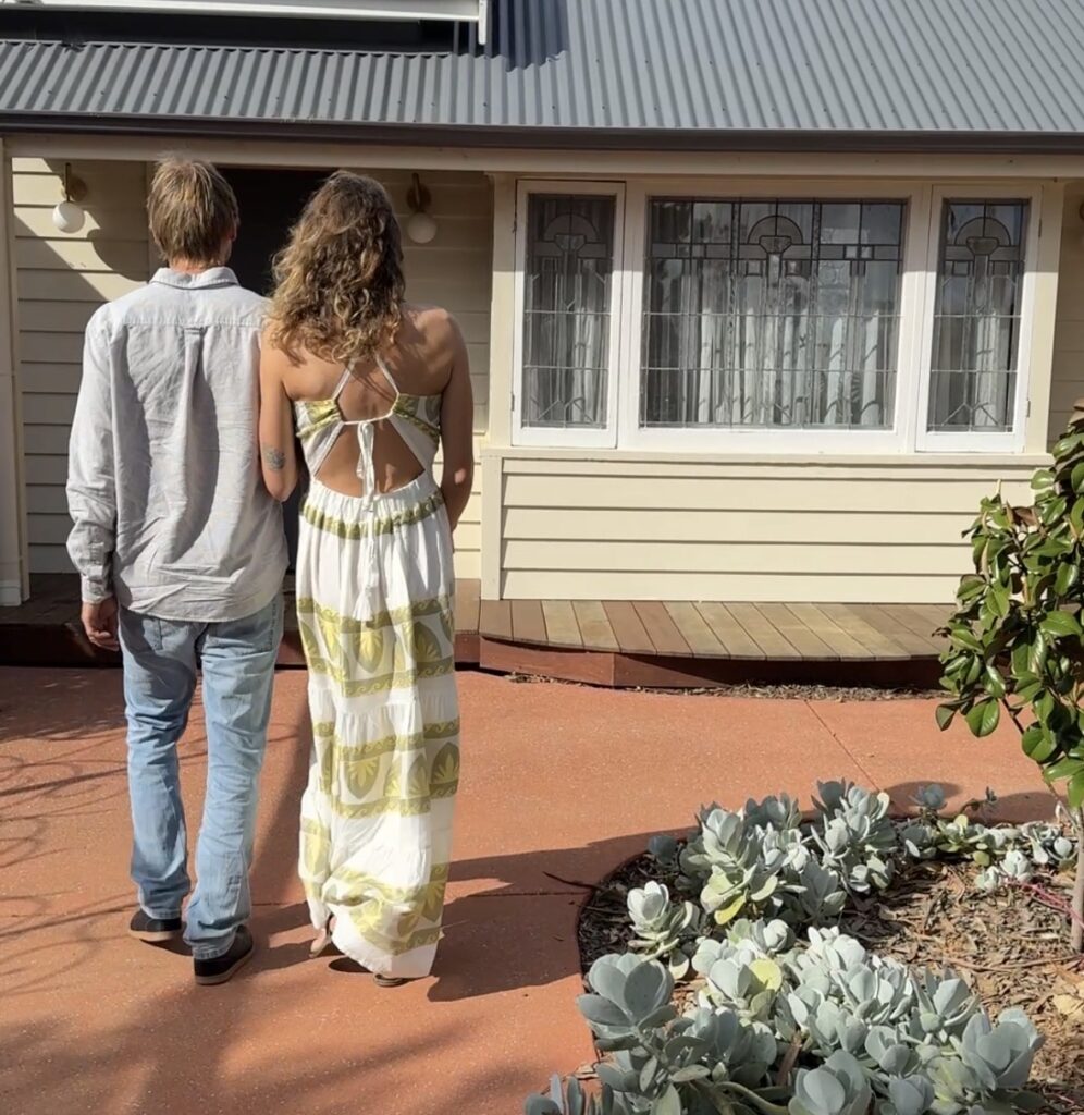 couple walking into the Margaret River Marriage Office